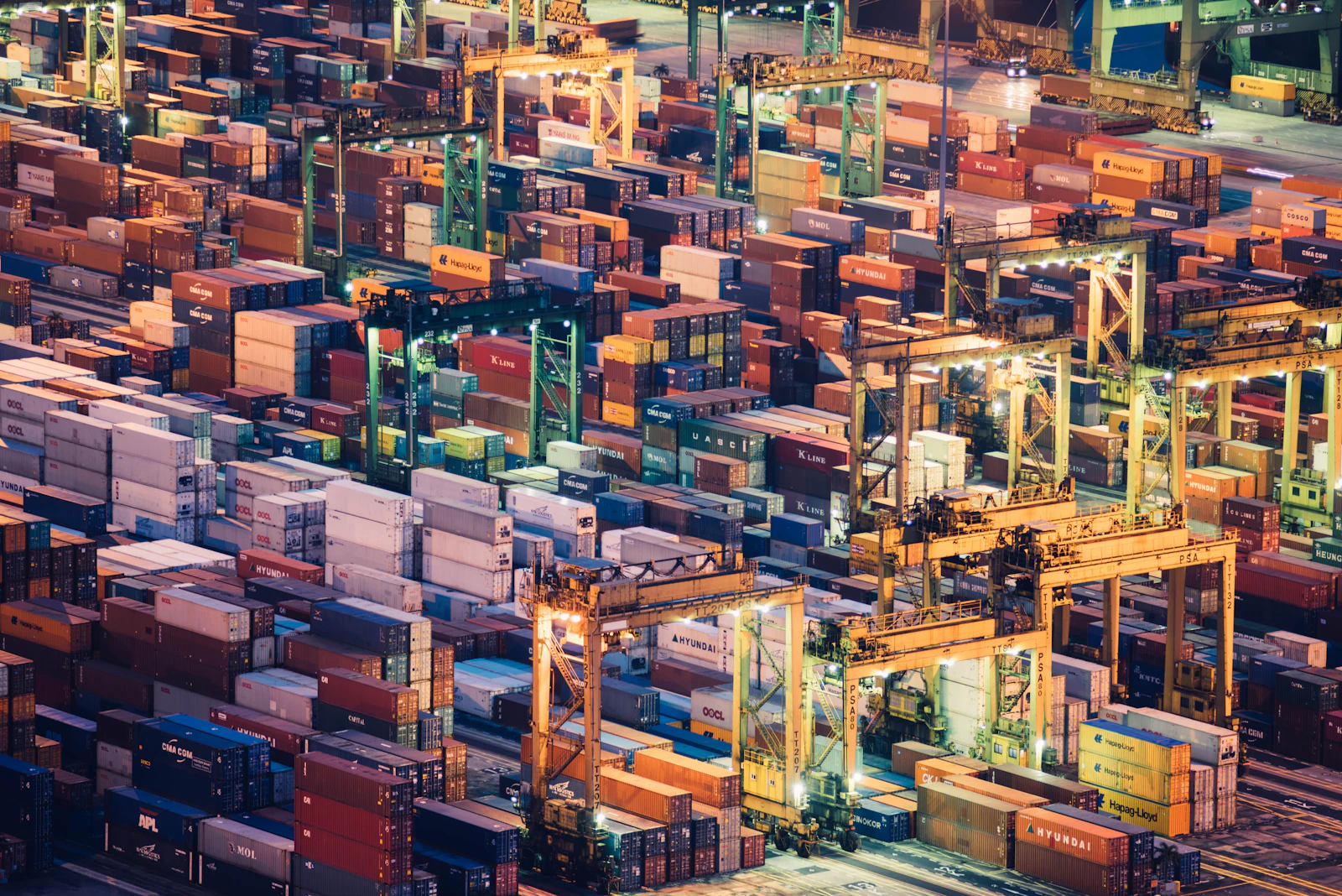 An illuminated container port viewed from above